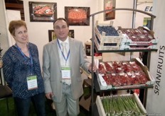 Christina Becker and Oliver Salles in their Span Fruits stand, French company marketer of fruit and vegetables produced in Spain.