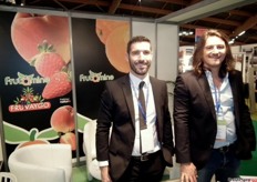 Eric de Los Santos and Arnau León, in their Frutamine stand, a Spanish trading company of stone fruit, citrus fruit and strawberries.