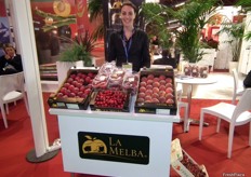 Leticia Dozieriin her Cooperative La Melba stand, promoting their new campaign of stone fruit.